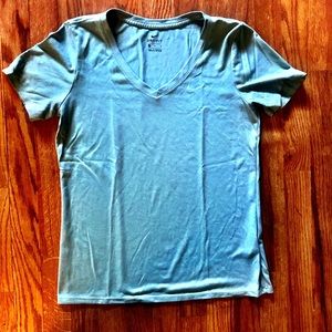 Women’s Nike “Dri-Fit” short sleeve shirt